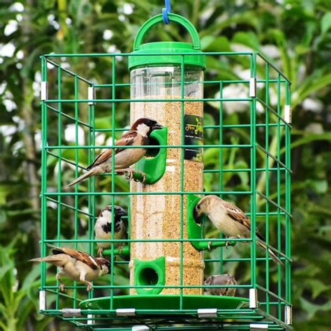 house shaped metal bird feeder|pigeon resistant bird feeders.